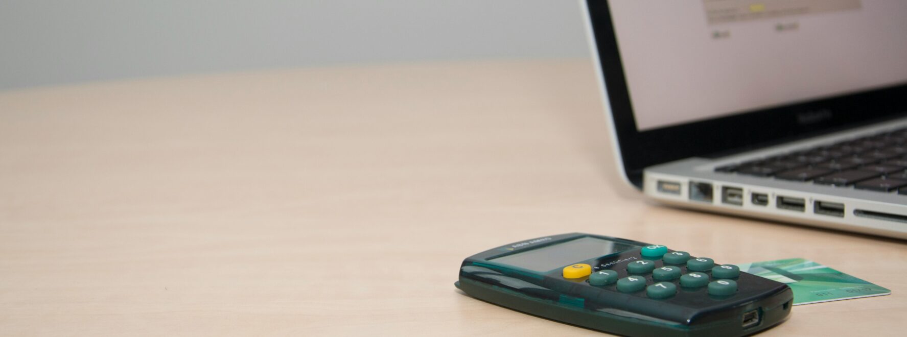 Laptop and credit card on the table