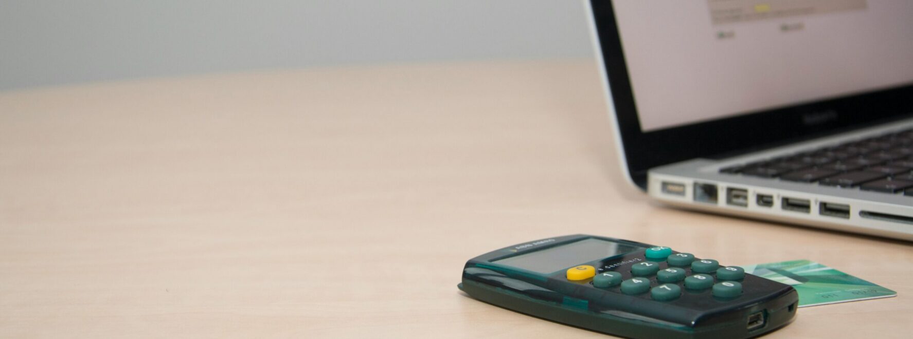 Laptop and credit card on the table